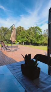 a table with a blue table cloth and a playground at Casa de Ferro 287 Aconchego e Praticidade in Venâncio Aires +35 photos