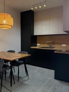 Kuchyň nebo kuchyňský kout v ubytování New Apart
