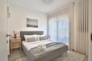 Postel nebo postele na pokoji v ubytování Lime Luxe Haifa - 2BR by the SEA