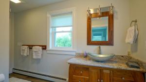 a bathroom with a bowl sink and a window at The Still Pond Inn in Still Pond +19 photos