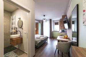 Katil atau katil-katil dalam bilik di Velunia Residence +77 gambar