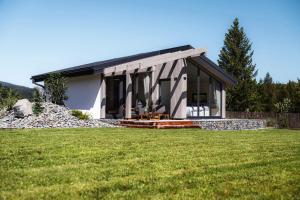 a house with a large yard in front of it at Na Kameni in Vsetín