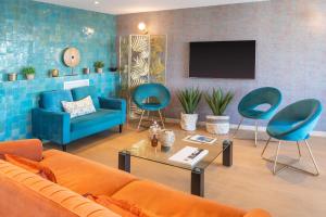 Televisyen dan/atau pusat hiburan di Best Western Plus Hôtel la Rade