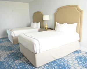 Giường trong phòng chung tại Harlow's Casino Resort & Spa +22 ảnh