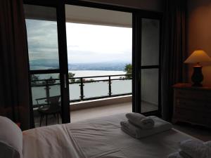 Postel nebo postele na pokoji v ubytování RUBONA HILL Lodge