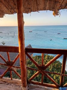 a view of the ocean from a hut at Nils Home in Nungwi