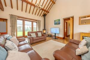 TV a/nebo společenská místnost v ubytování Trehafod