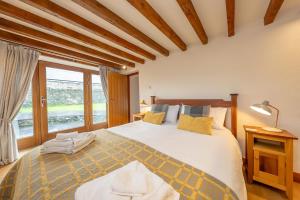 Postel nebo postele na pokoji v ubytování Trehafod + 24 fotografií