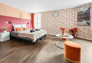 Postel nebo postele na pokoji v ubytování Balnéo Privée Wifi Fibre Chic & Détente Romantique