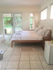 Ένα ή περισσότερα κρεβάτια σε δωμάτιο στο The Willow Studio