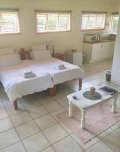 Ένα ή περισσότερα κρεβάτια σε δωμάτιο στο The Willow Studio