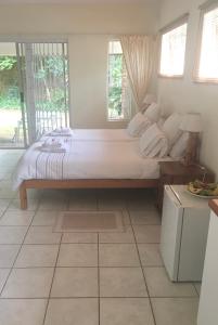 Ένα ή περισσότερα κρεβάτια σε δωμάτιο στο The Willow Studio +6 φωτογραφίες