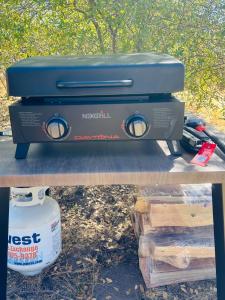 a toaster sitting on top of a table at Rocky Ridge Glamping Yosemite in Coarsegold