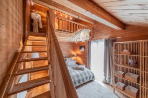 Ένα ή περισσότερα κρεβάτια σε δωμάτιο στο Chambre D'hôte au Chalet Datcha