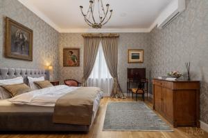 Postel nebo postele na pokoji v ubytování Kastély szállás