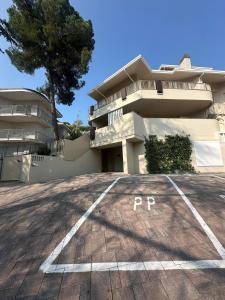 an empty parking lot in front of a building at Colle del Mare in Gabicce Mare