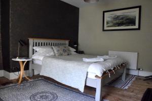 Postel nebo postele na pokoji v ubytování Hiraeth Homestay xxx