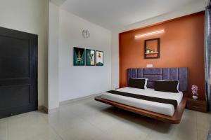 Postel nebo postele na pokoji v ubytování SPOT ON Hotel Mezbaani