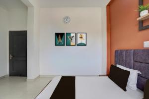 Postel nebo postele na pokoji v ubytování SPOT ON Hotel Mezbaani