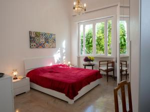 Ένα ή περισσότερα κρεβάτια σε δωμάτιο στο Villa Rosa Mondello