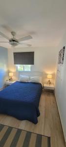 Una cama o camas en una habitación de Boca Paraíso 113