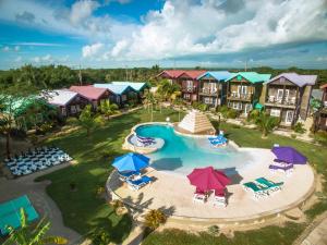 an aerial view of a resort with a swimming pool at X'tan Ha- The Waterfront in San Pedro