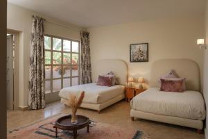 Postel nebo postele na pokoji v ubytování Villa Monica + 64 fotografií