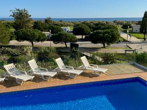 Bazén v ubytování Pérola do Oceano nebo v jeho okolí