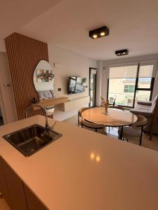 TV/trung tâm giải trí tại Departamento Frente al Mar +10 ảnh