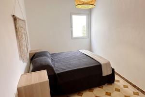 Giường trong phòng chung tại Blue Bay Lux House