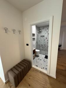 a bathroom with a toilet and a mirror at Marta Apartment in Čitluk +30 photos