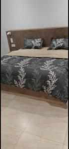 Villa de luxe à ngaparou Saly centerにあるベッド