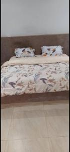 Villa de luxe à ngaparou Saly centerにあるベッド