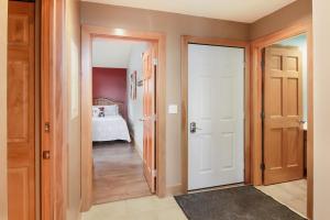 Postel nebo postele na pokoji v ubytování Ski-In 5BR Retreat at Boyne Mtn - Walk to Lifts & Fun!