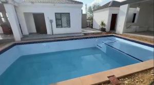 Bazén v ubytování Casa-Pel Guest Wing nebo v jeho okolí