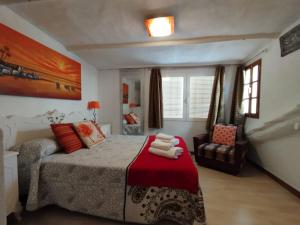 En eller flere senge i et værelse på La Casilla de Nigüelas
