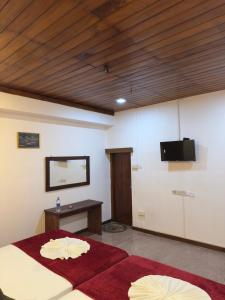 TV a/nebo společenská místnost v ubytování Solace More Hotel - Borella 2