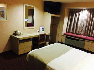 Postel nebo postele na pokoji v ubytování Microtel Inn & Suites by Wyndham Syracuse Baldwinsville
