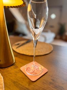a wine glass sitting on top of a table at La Casa De Campo in Long Preston