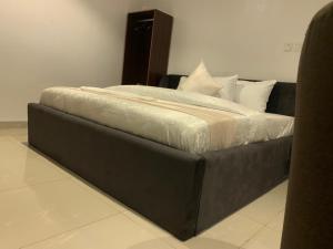 Ένα ή περισσότερα κρεβάτια σε δωμάτιο στο IVORY EXCLUSIVE HOTEL AND SUITEs