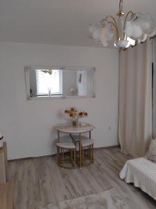 Ένα ή περισσότερα κρεβάτια σε δωμάτιο στο MIWi