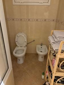 a bathroom with a toilet and a sink at Tanja Pearl in Tangier +15 photos