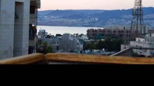 a view of a city from the balcony of a building at فندق برستيج العقبه Prestig in Aqaba +1 photo