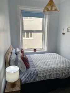 Ένα ή περισσότερα κρεβάτια σε δωμάτιο στο Pier View