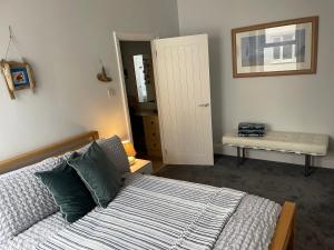 Ένα ή περισσότερα κρεβάτια σε δωμάτιο στο Pier View