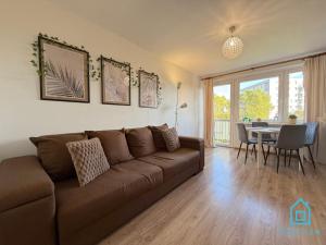 Χώρος καθιστικού στο Coconut Apartment - 5 min to Baltic Sea