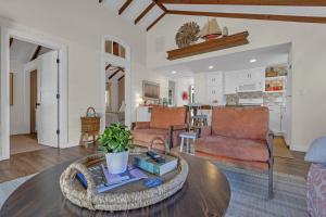 a living room with a couch and a table at Hot Tub 3BR Lavallette Girls Trip at the Beach in Monterey Beach