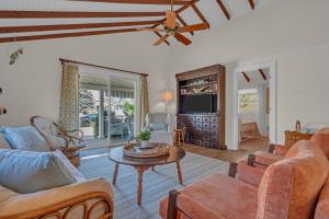 a living room with a couch and a table at Hot Tub 3BR Lavallette Girls Trip at the Beach in Monterey Beach