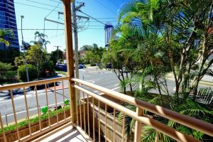 a balcony with a view of a street at 2-Bedroom Apt with Terraces in Gold Coast +6 photos