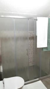 a bathroom with a glass shower with a toilet at Zem Zem kuća za odmor in Otoka +19 photos